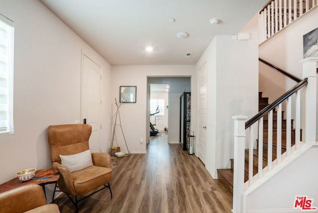 living area with wood-type flooring