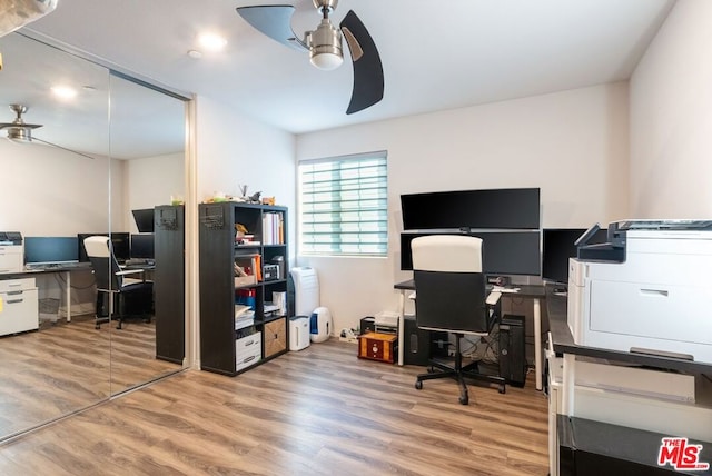 office space featuring hardwood / wood-style flooring and ceiling fan