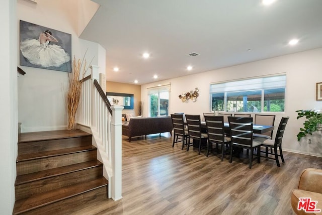 dining area featuring hardwood / wood-style floors