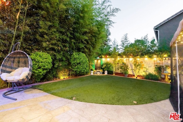 view of yard with a patio area