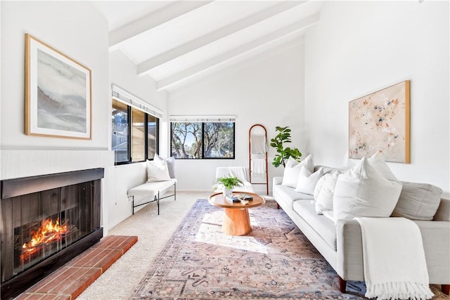 living room with carpet and vaulted ceiling with beams