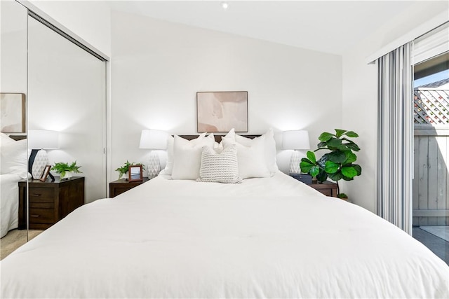 bedroom featuring vaulted ceiling