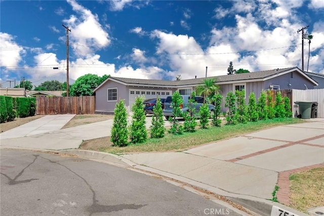 ranch-style house featuring a garage