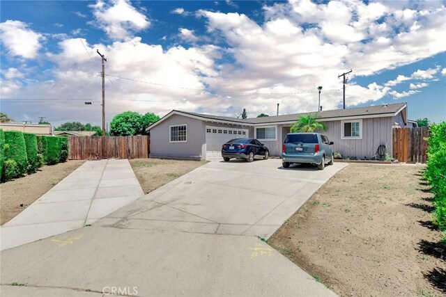 ranch-style home with a garage