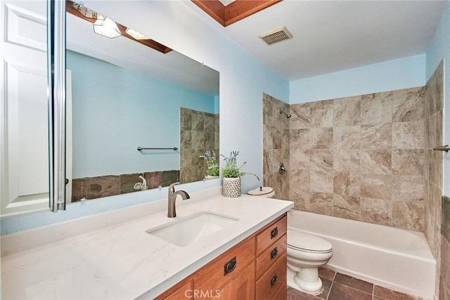 full bathroom featuring visible vents, toilet, washtub / shower combination, vanity, and tile patterned floors