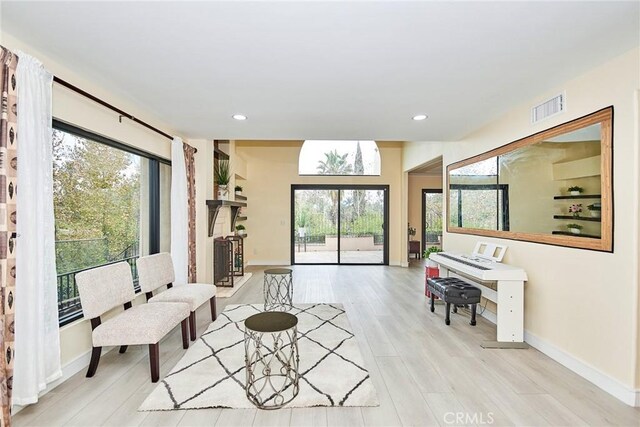 living area featuring light wood-type flooring