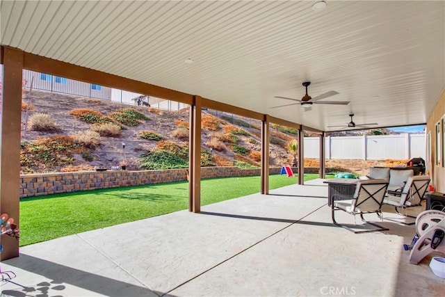 view of patio with ceiling fan