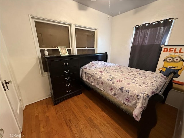 bedroom featuring hardwood / wood-style floors