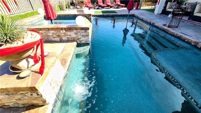 view of pool with a patio