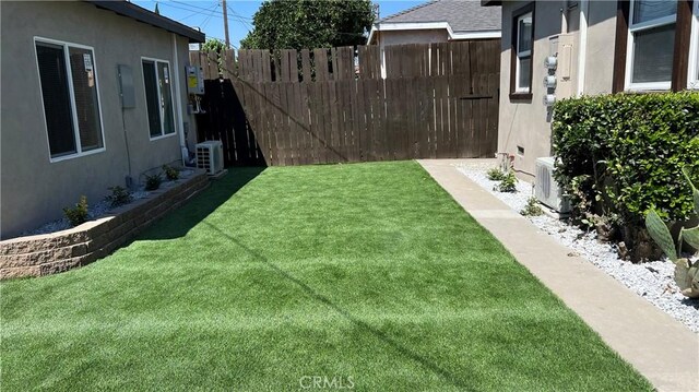 view of yard with cooling unit