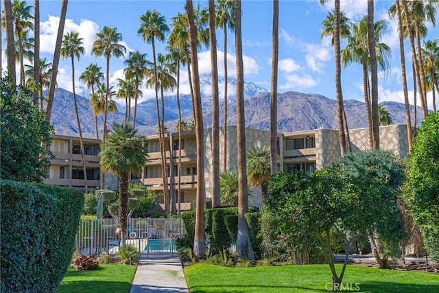 view of building exterior with a mountain view