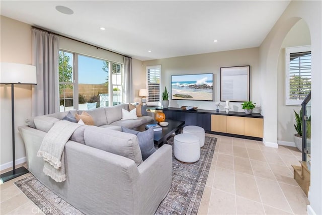 living room with light tile patterned floors