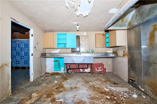 kitchen featuring a textured ceiling