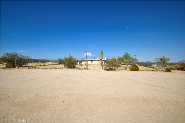 view of yard with a rural view