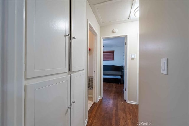 hall with dark wood-type flooring