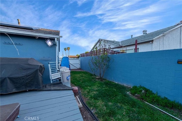 view of yard with a deck