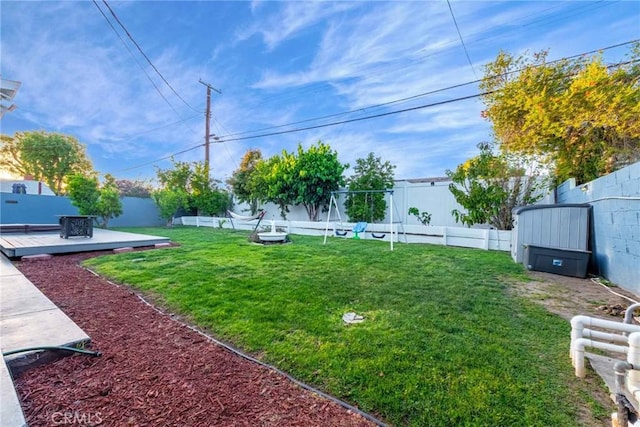 view of yard featuring a deck