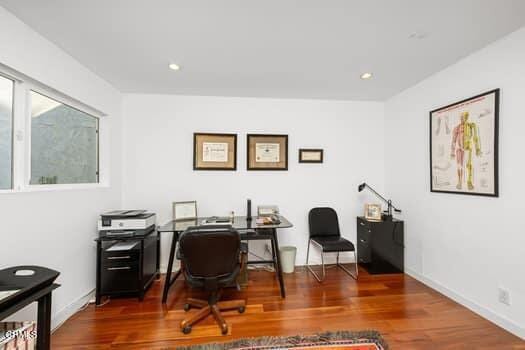 office area with dark hardwood / wood-style floors