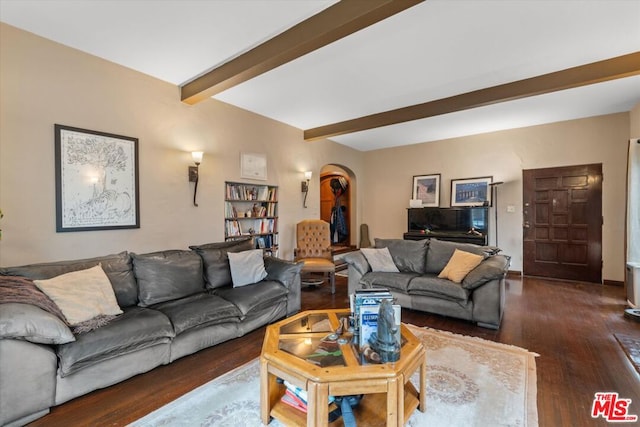 living room featuring beam ceiling and dark hardwood / wood-style flooring