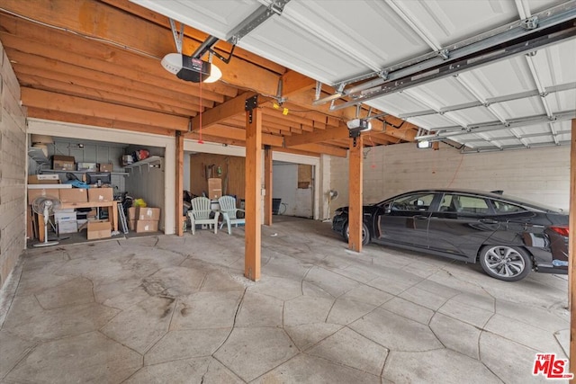 garage featuring a garage door opener