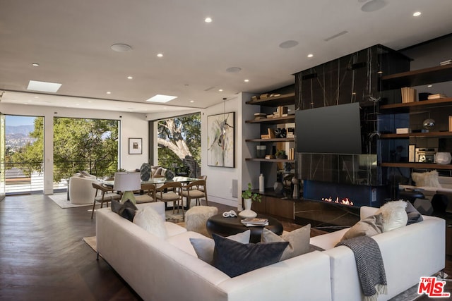 living room with dark parquet flooring