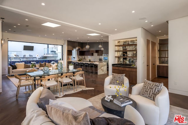 living room with dark hardwood / wood-style floors