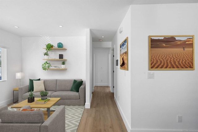 living room with light hardwood / wood-style flooring