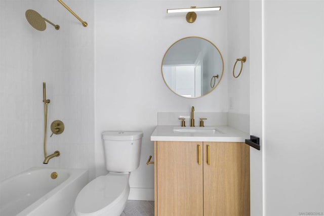 full bathroom with toilet, tiled shower / bath, and vanity