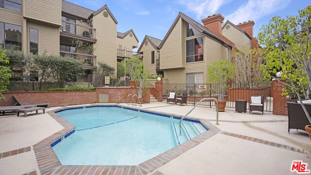 view of pool with a patio area