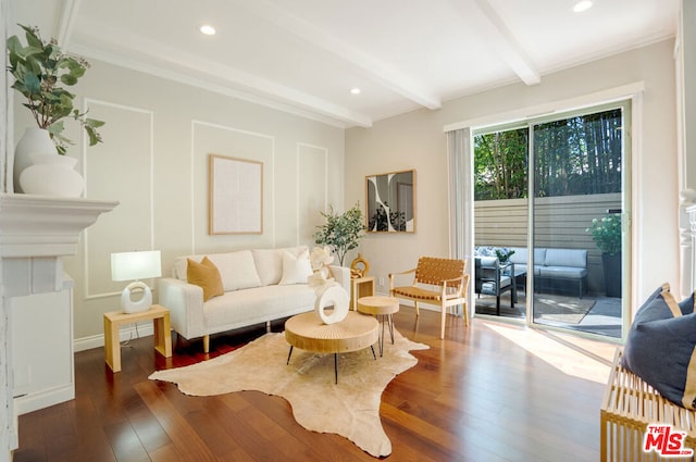 living room featuring beam ceiling and hardwood / wood-style flooring