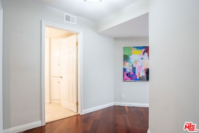 corridor featuring hardwood / wood-style flooring