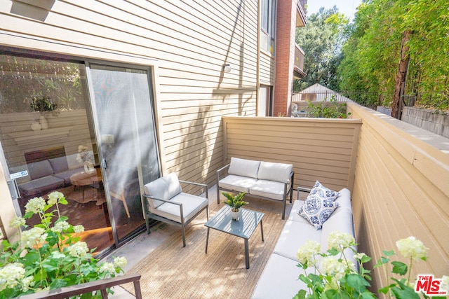 exterior space featuring an outdoor hangout area