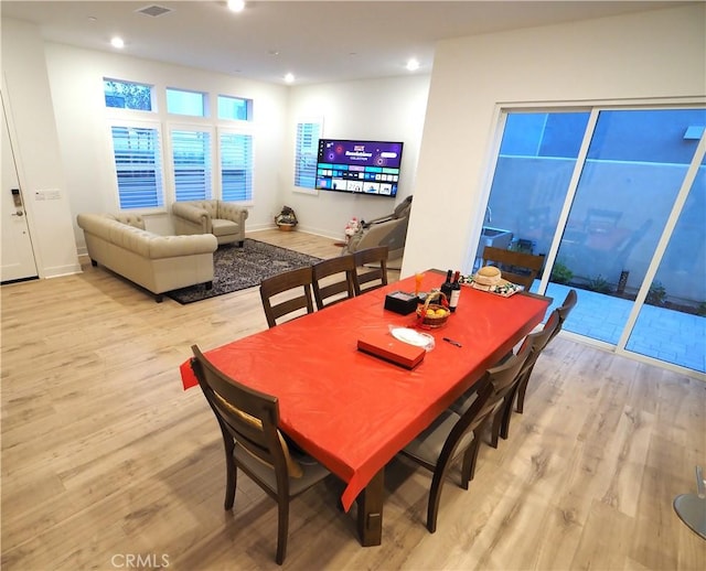 dining room with light wood-type flooring