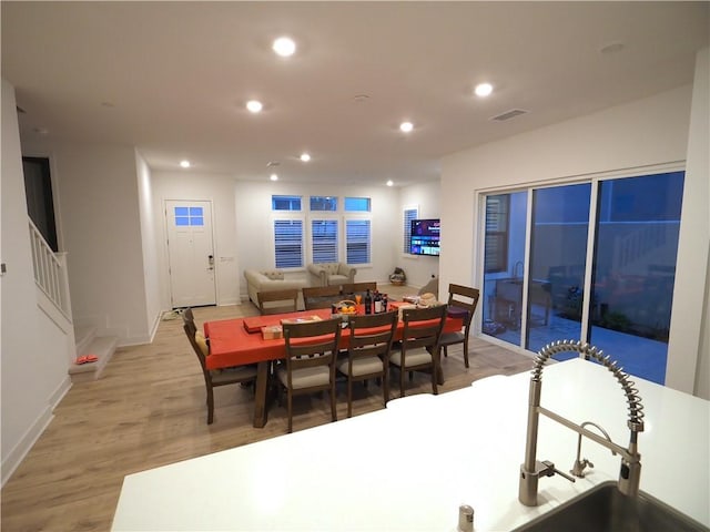 dining area featuring light hardwood / wood-style floors