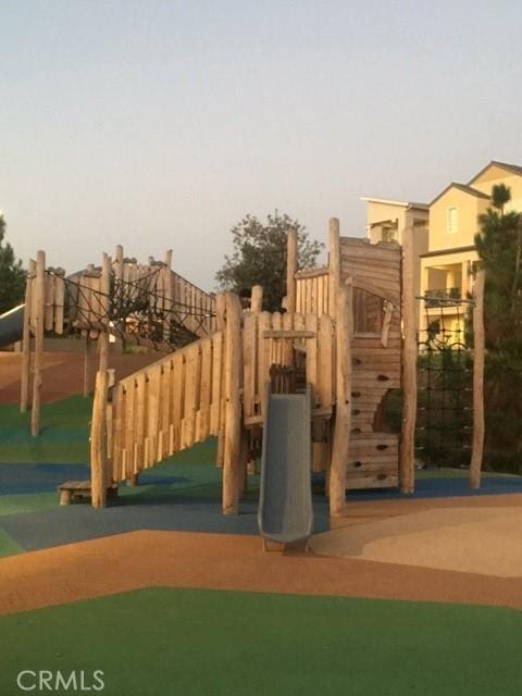 view of playground at dusk