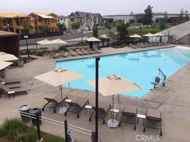 view of swimming pool featuring a patio