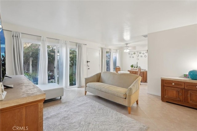 bedroom featuring ceiling fan and light tile patterned floors