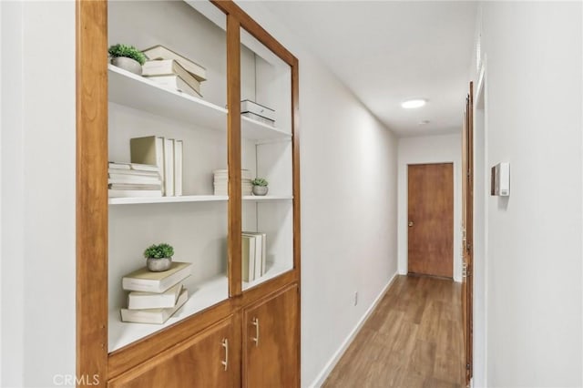 corridor featuring light wood-type flooring