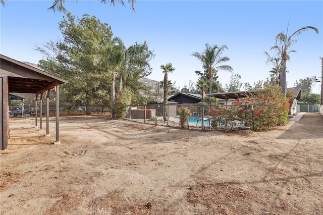 view of yard featuring a pool