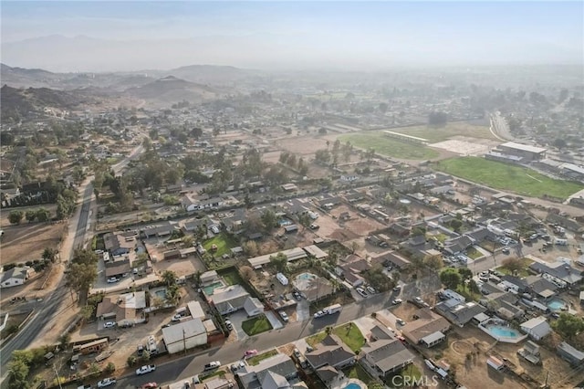 drone / aerial view featuring a mountain view