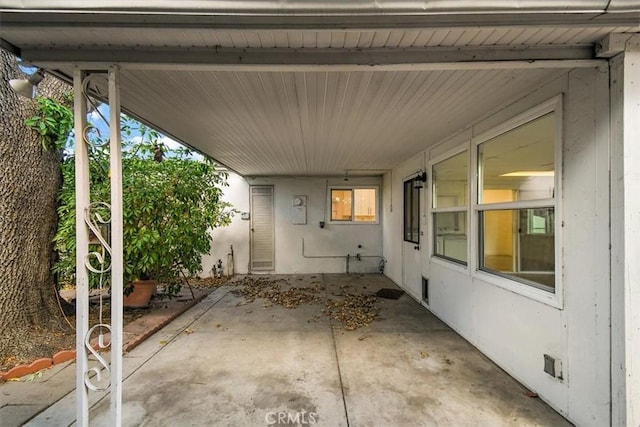 view of patio / terrace with a carport