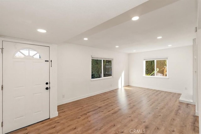 foyer with light wood-type flooring