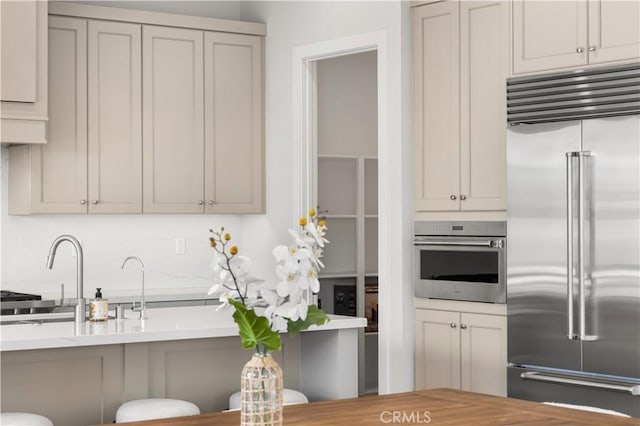 kitchen with appliances with stainless steel finishes and a sink