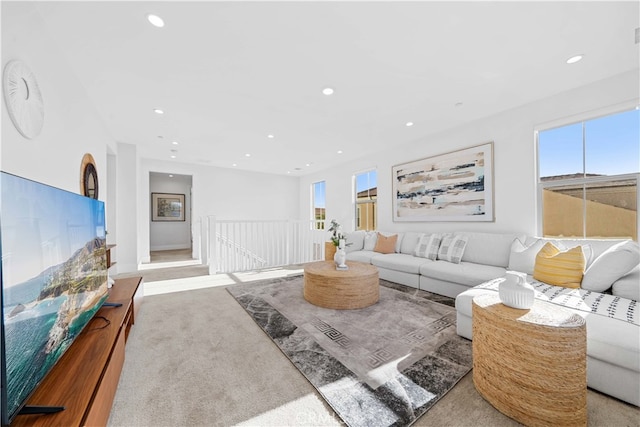 living room with carpet floors and recessed lighting