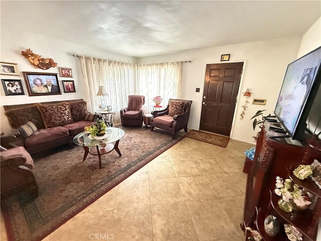 living room with light tile patterned flooring