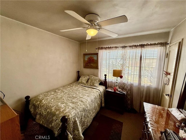 bedroom featuring ceiling fan