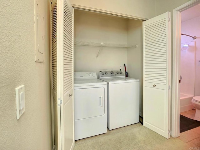 laundry area featuring independent washer and dryer