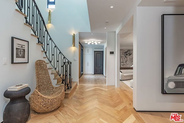 foyer entrance featuring parquet floors