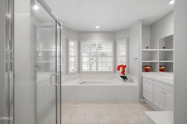 full bathroom with recessed lighting, a stall shower, vanity, a bath, and tile patterned floors