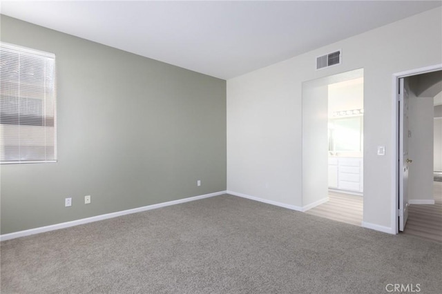 view of carpeted spare room